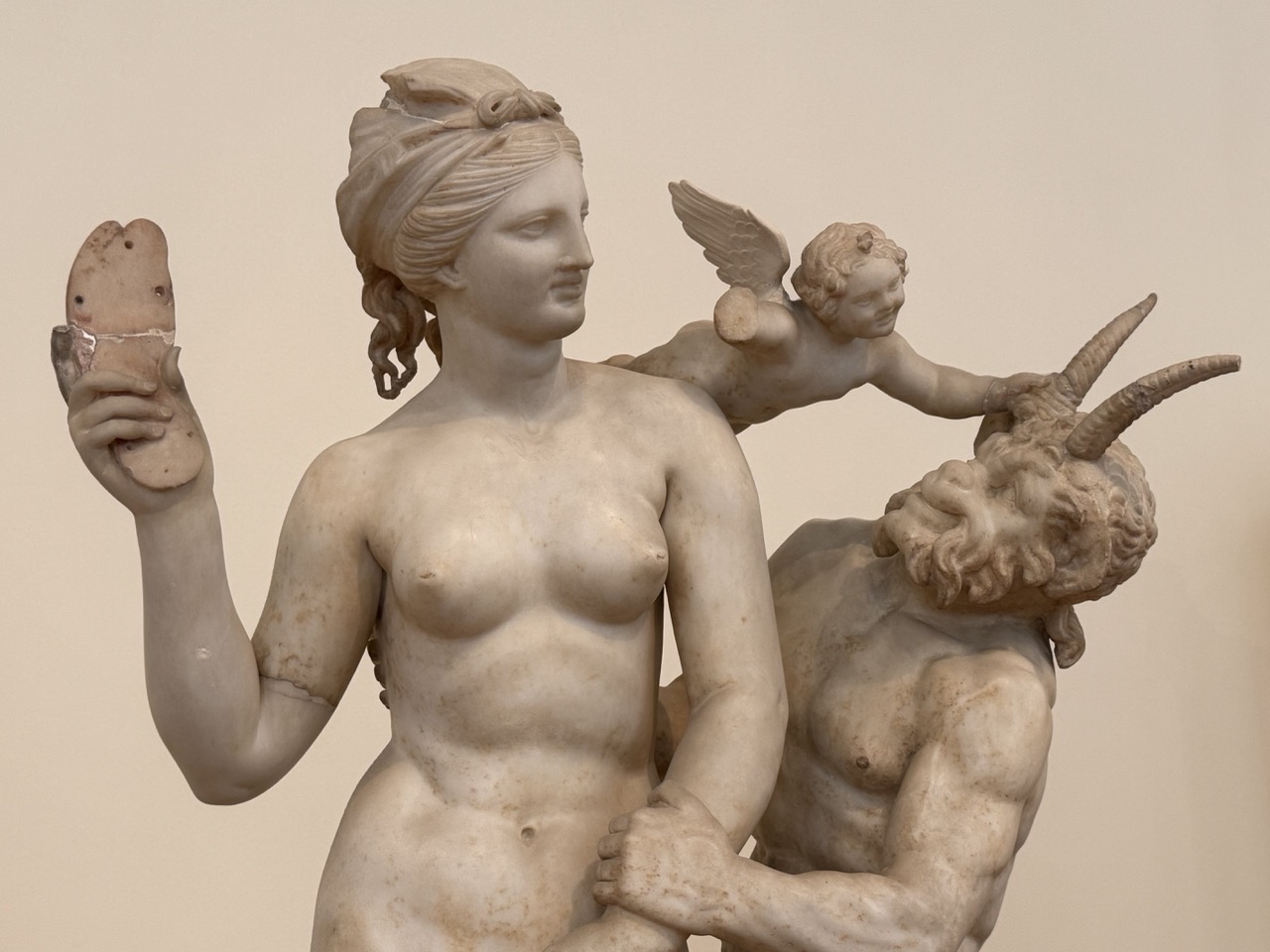 Aphrodite giving Pan the chancla