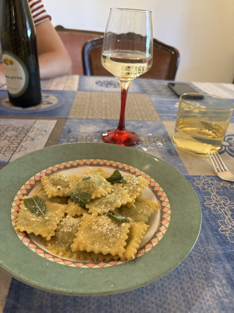 Ravioli served with thyme and a little Parmesan